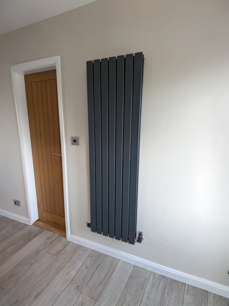 Tall flat anthracite rad